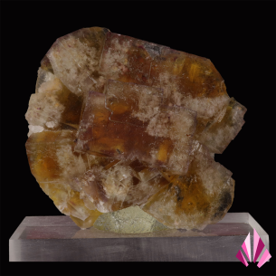 Fluorine marron de Valzergues dans l’Aveyron, cristaux translucides aux tons miel et brun