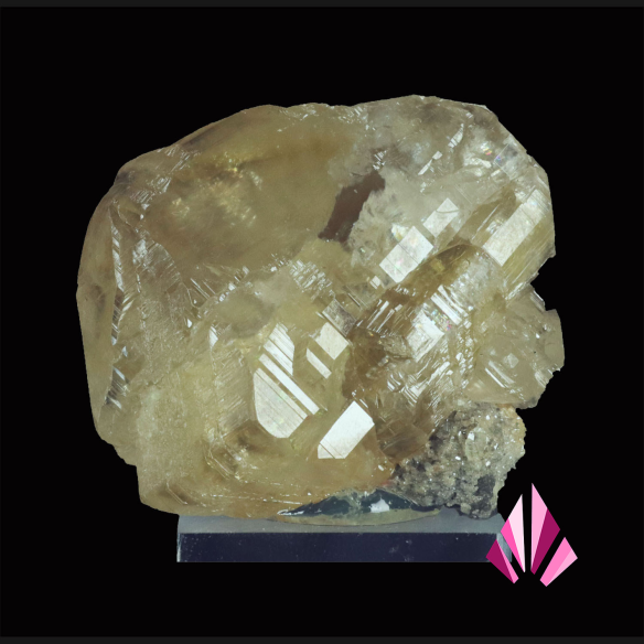 Cérusite du Maroc, grand cristal translucide aux teintes claires sur socle