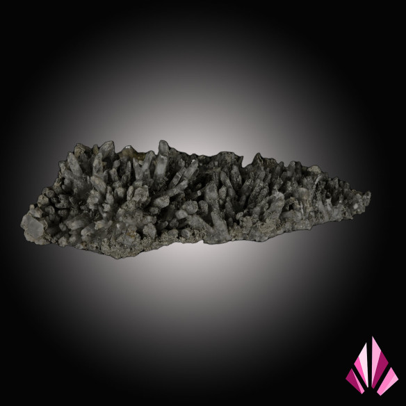 Quartz sprinkled with pyrite and scattered small baryte crystals.