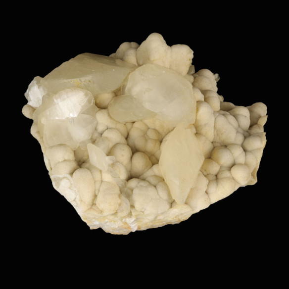 Calcite from Laki, Bulgaria, side view of large crystals on rounded matrix