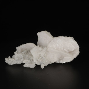 Manganocalcite on quartz from Zlatograd, Bulgaria, very pale pink crystals associated with quartz